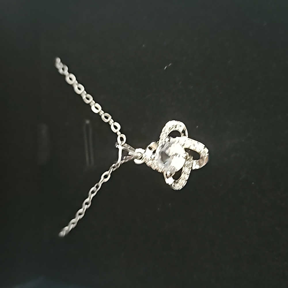 Women's silver necklace with cubic zirconia inlay clover pendant
